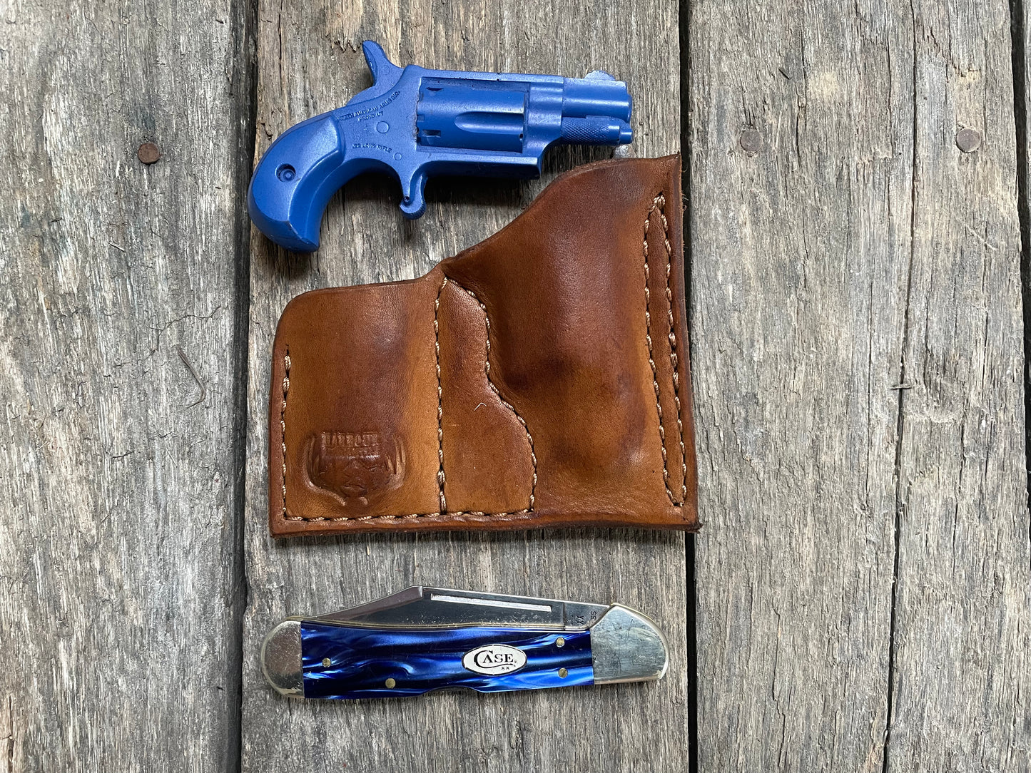 
                  
                    NAA North American Arms Pug 22 mag holster with pocket knife holder
                  
                