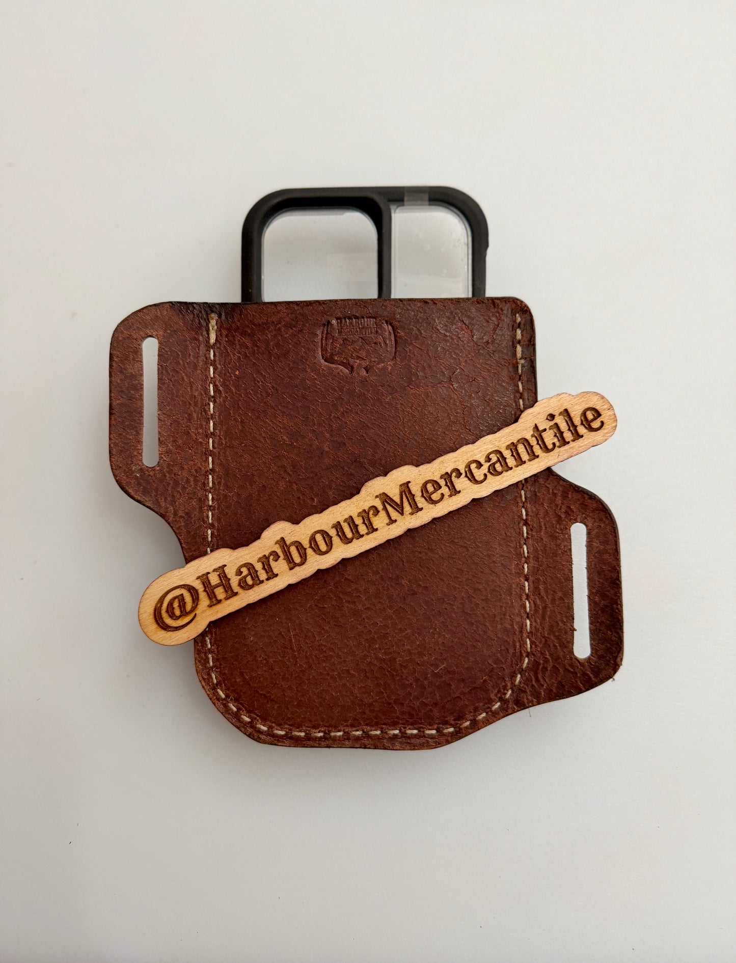 
                  
                    Crossdraw cell phone holster
                  
                