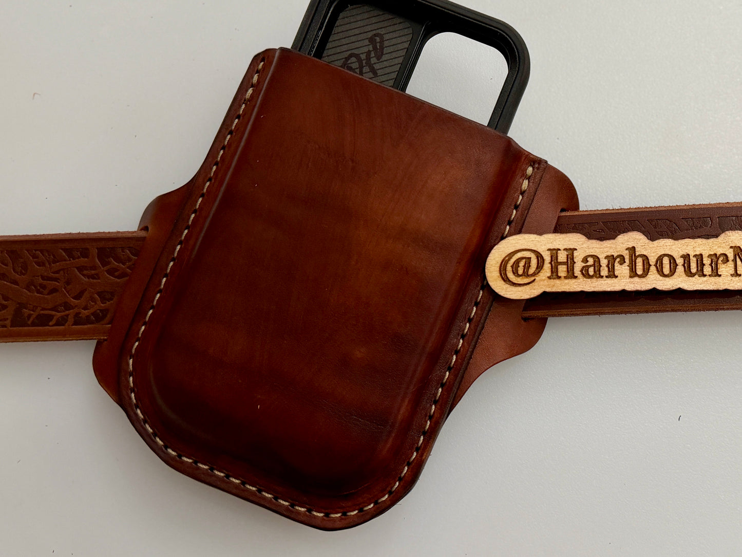 
                  
                    Crossdraw cell phone holster
                  
                