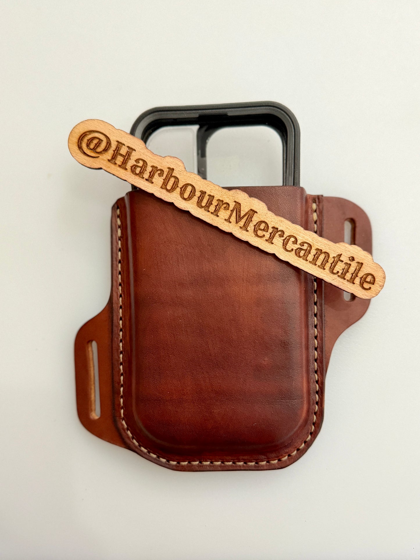 
                  
                    Crossdraw cell phone holster
                  
                
