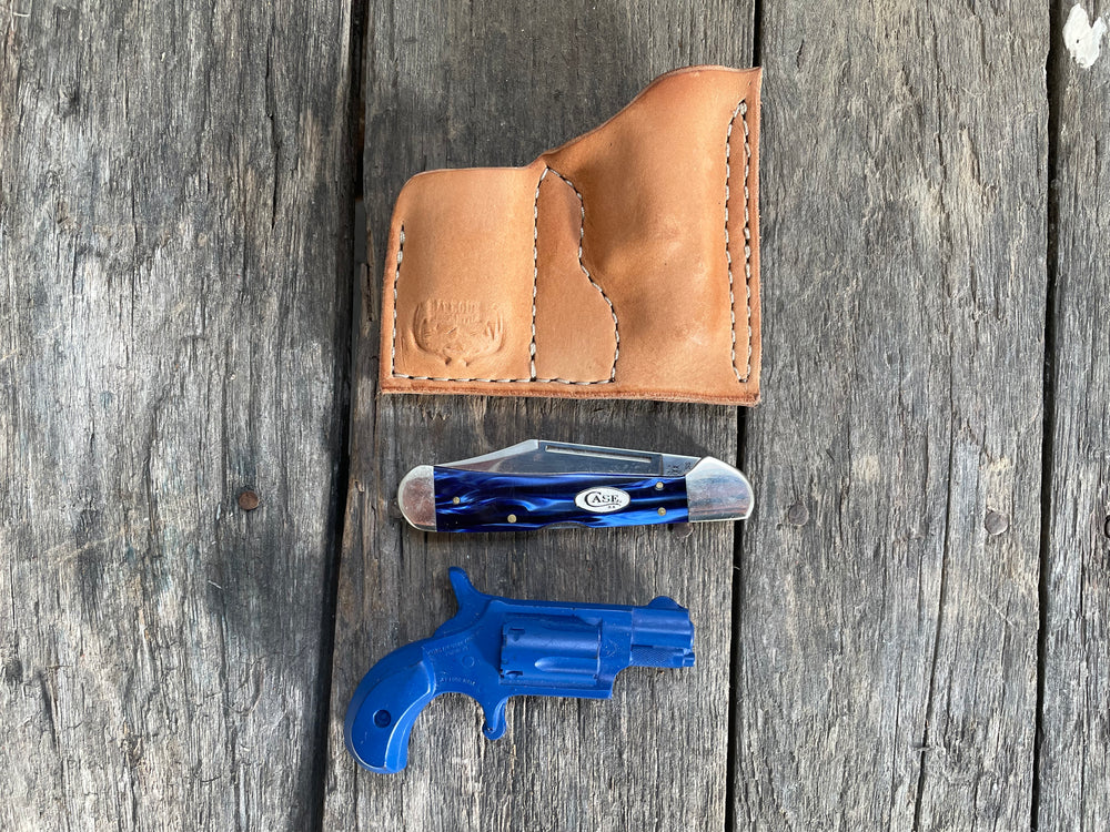 
                  
                    NAA North American Arms Pug 22 mag holster with pocket knife holder
                  
                