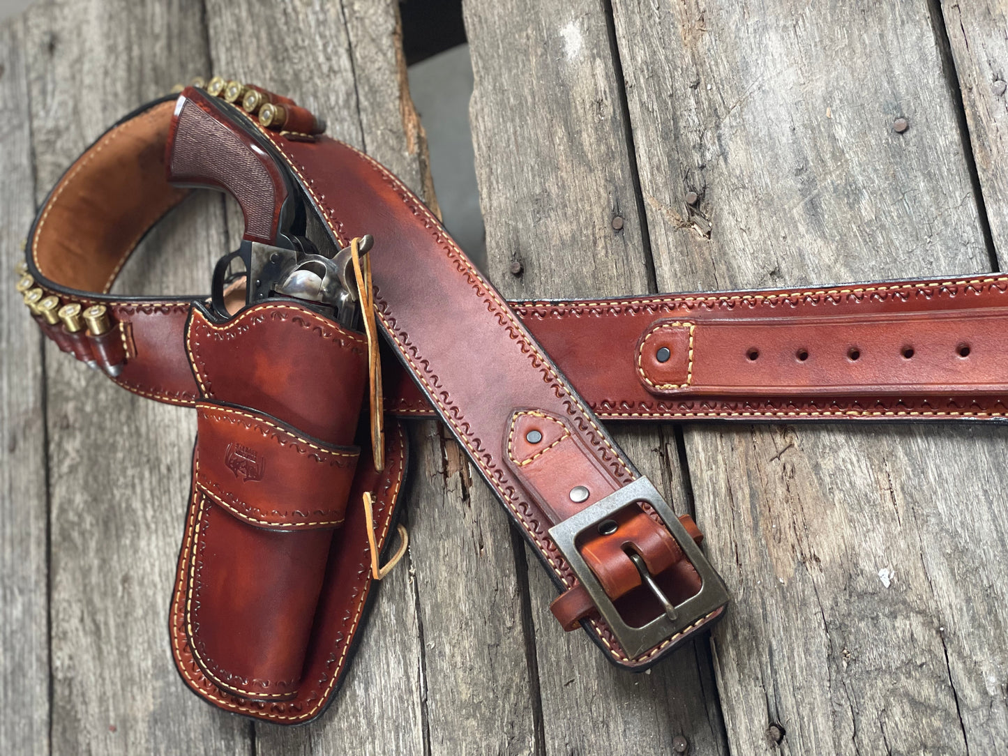 
                  
                    Lined single holster cowboy rig with bullet loops cowboy belt cartridge belt made in USA
                  
                